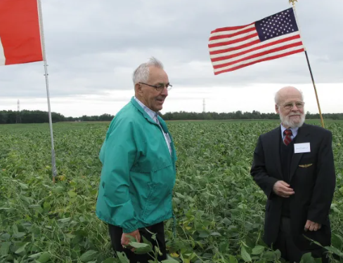 Ken Howe, left, five years old at the time of the crash, with David Cooper Jr., son of the pilot. He was two when his father perished in the wreckage on the farm of Howe’s parents.