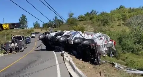 VIDEO: Vacuum truck driver charged after truck tips over on Caledon roads