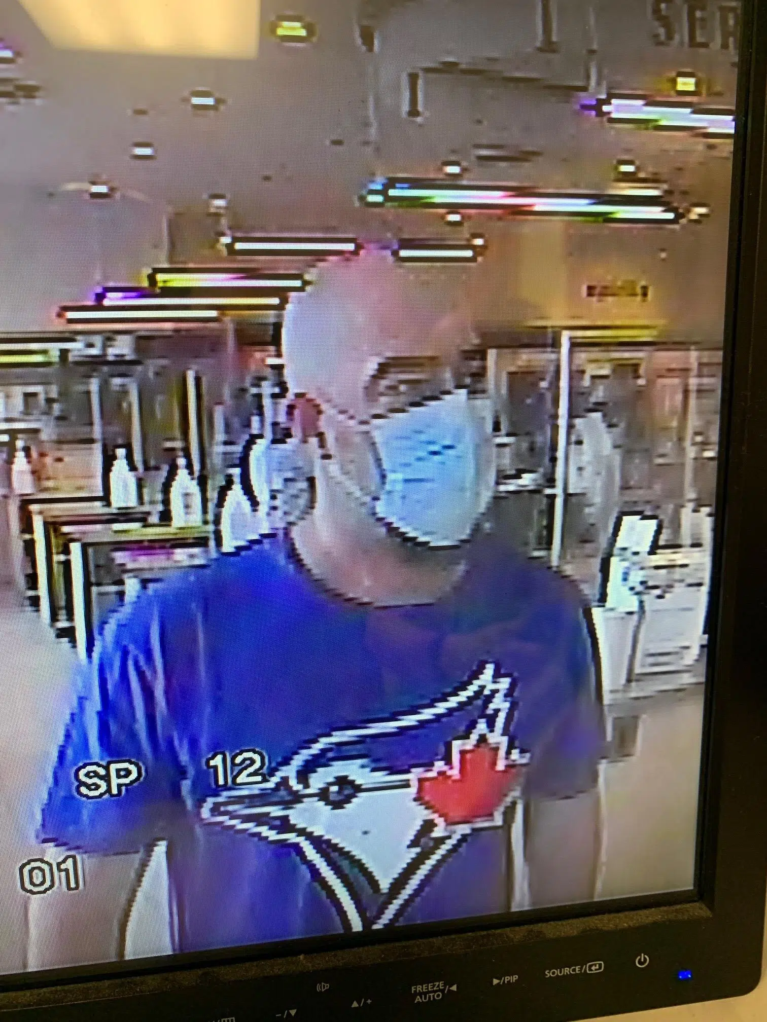 Police asking for assistance in identifying suspect in LCBO theft