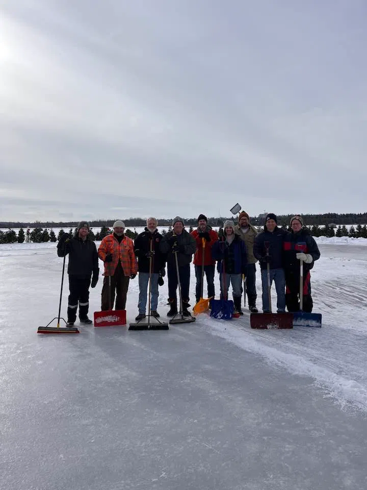 Volunteers preparing for Great Canadian Bonspiel on Island Lake January 25th