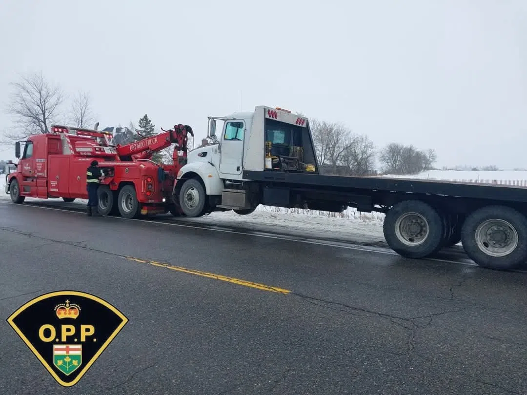 Tow truck driver and company charged