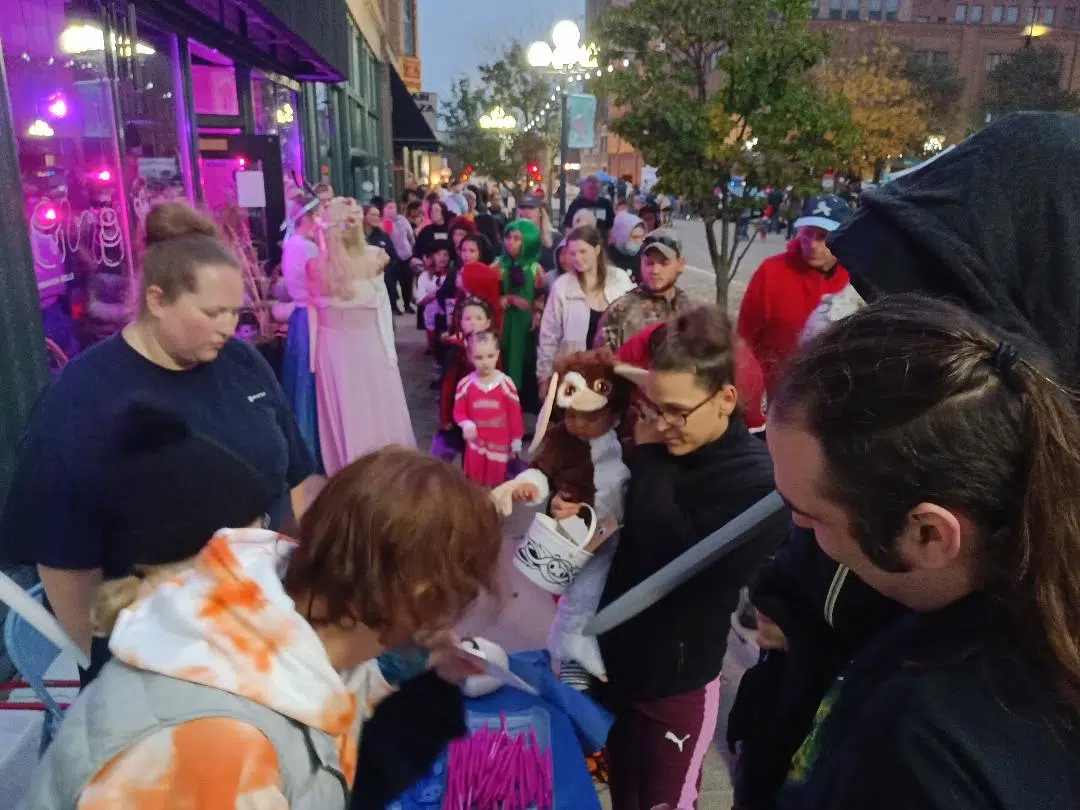 Thousands Swarm Downtown Bloomington for Treats
