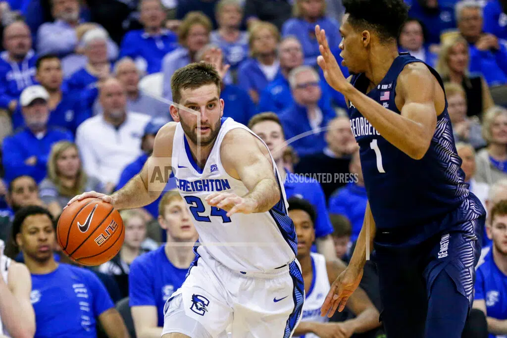 No. 11 Creighton lets 3s fly in 91-76 win over Georgetown