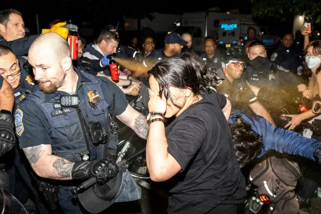 Police clear pro-Palestinian protest camp and arrest 33 at DC campus as mayor's hearing is canceled