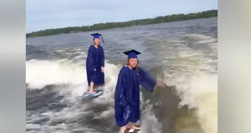 WATCH: Manitoba Twins Surf in Grad Gowns
