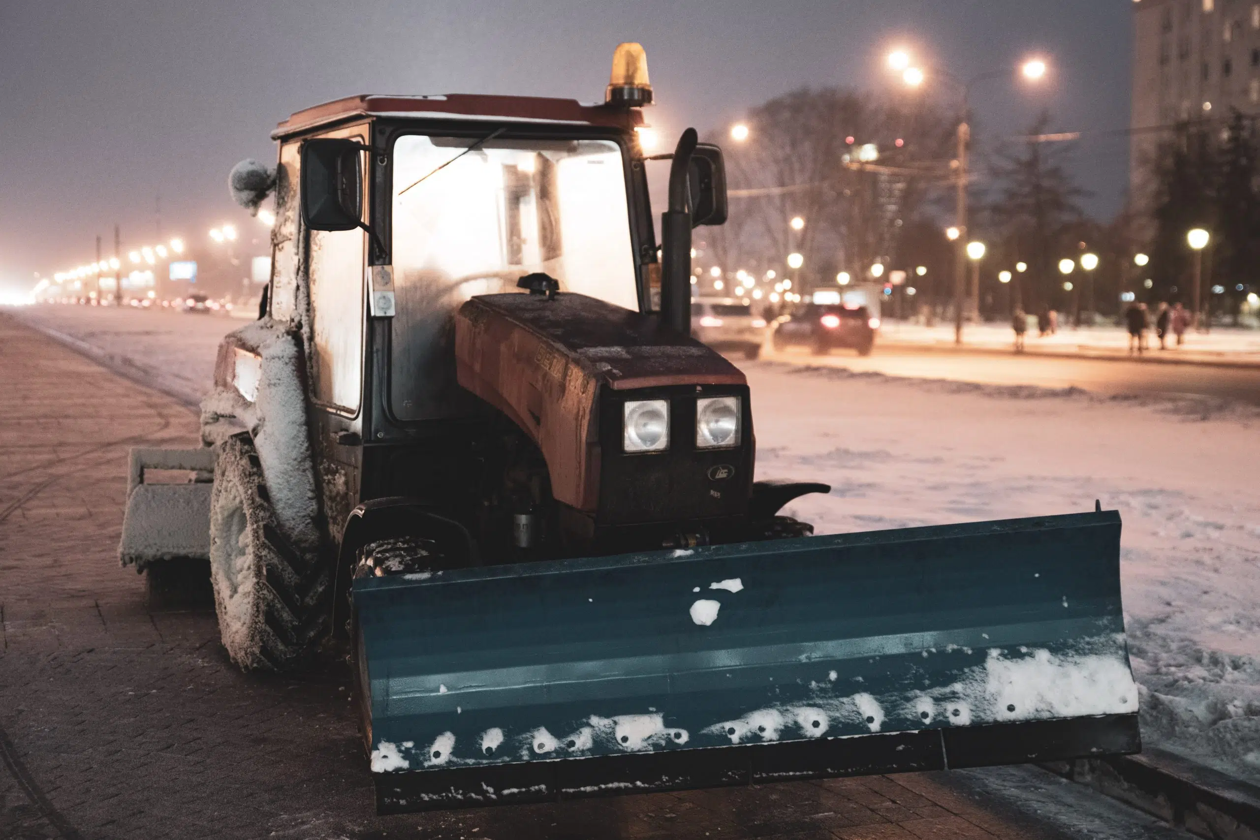 The Etiquette of Meeting a Snowplow in a Parking Lot