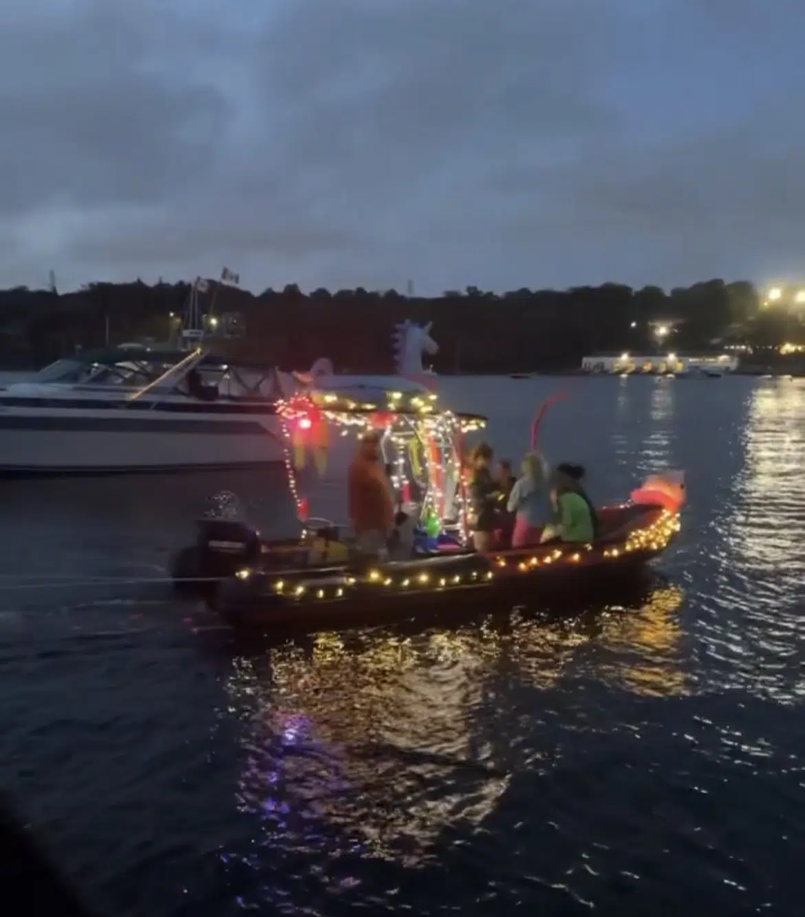 Boats light up the North West Arm Saturday night for century-old tradition to mark the end of Summer