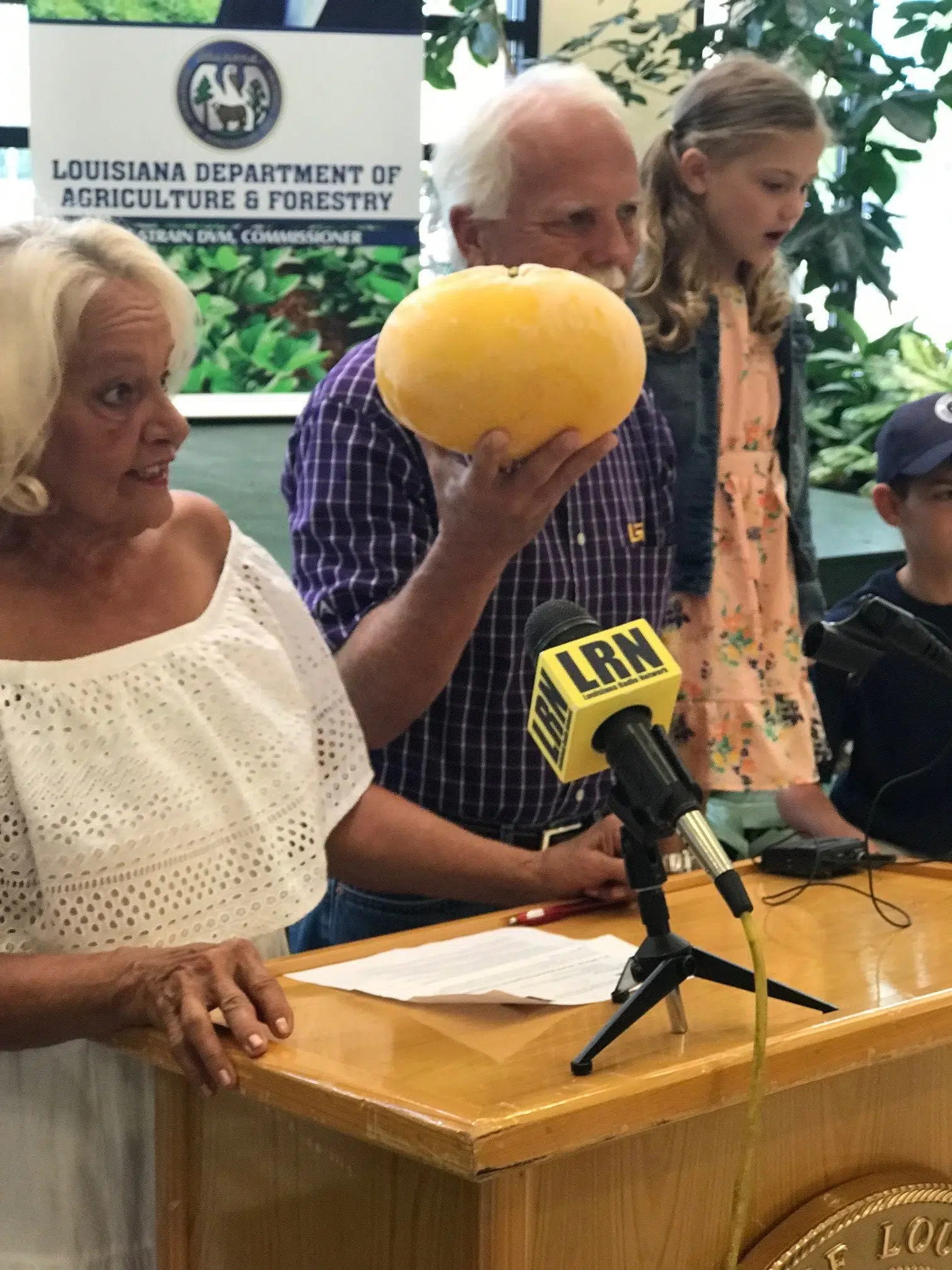 Slidell couple grows record-sized grapefruit, credits fairy magic for results