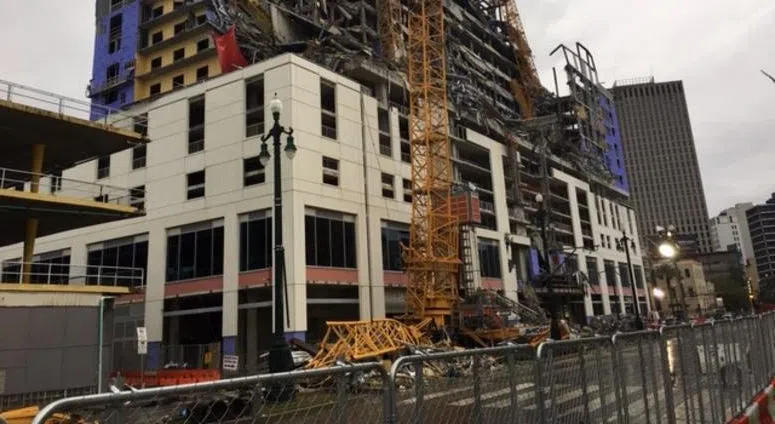 New tarp put up to shield the remains of trapped worker at Hard Rock hotel site