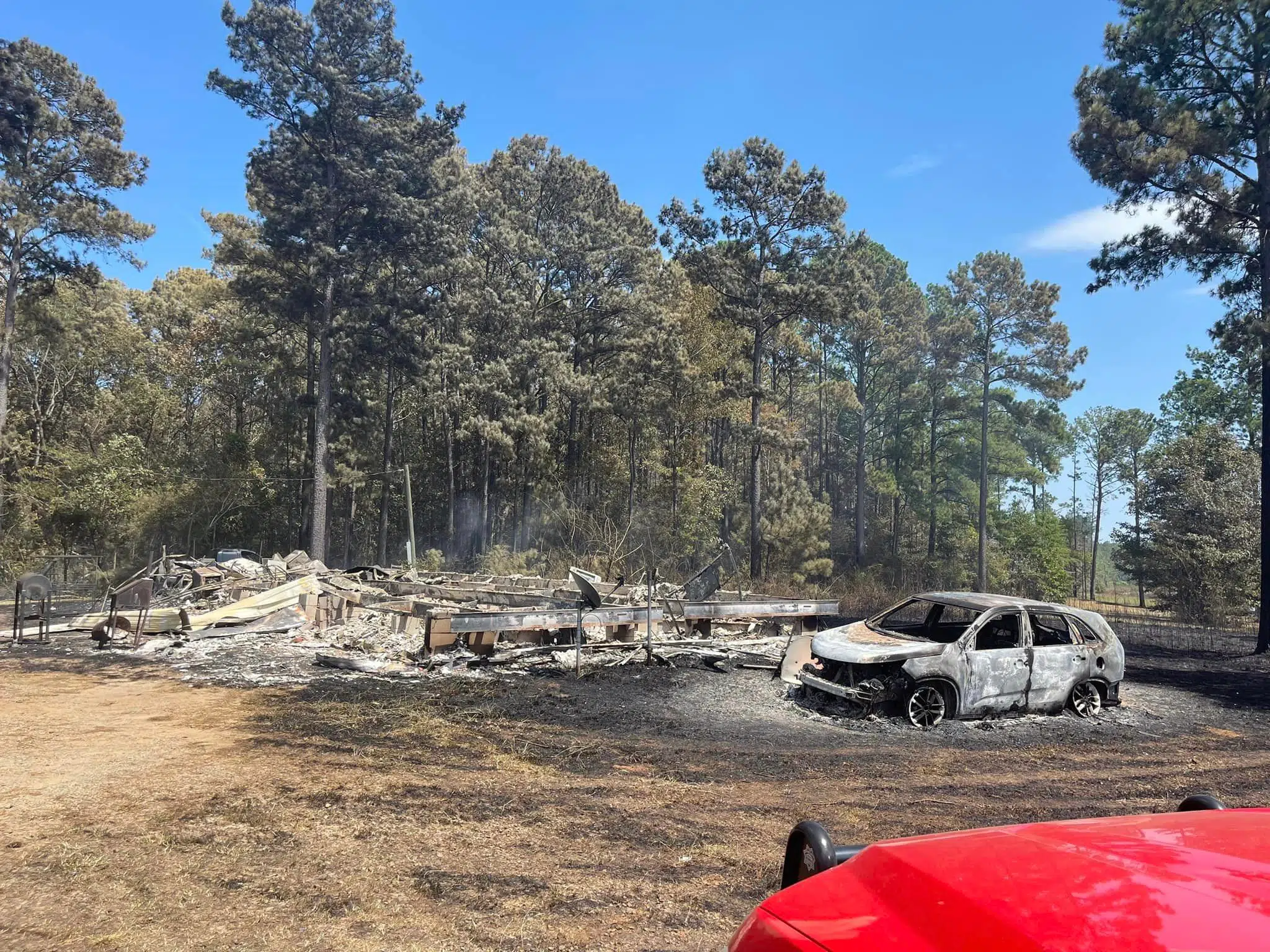 Fire crews continue to monitor contained wildfires in Sabine Parish