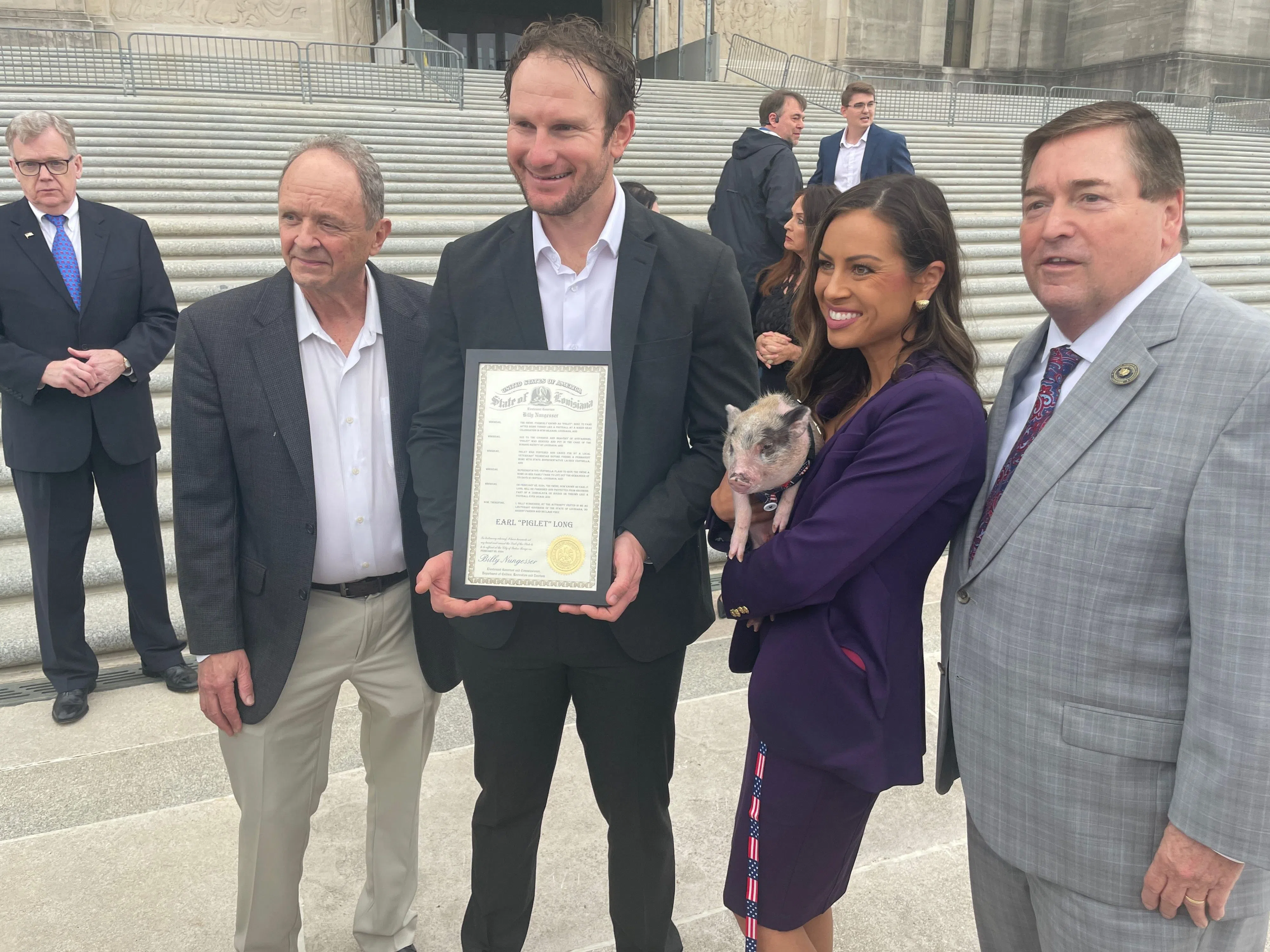 Pig that was tossed at Mardi Gras receives pardon