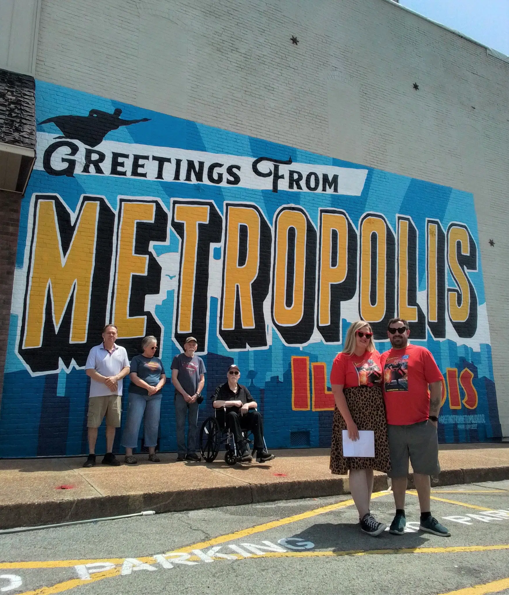 The "Greetings From Metropolis" Mural Ribbon Cutting Ceremony Took Place on Friday Morning