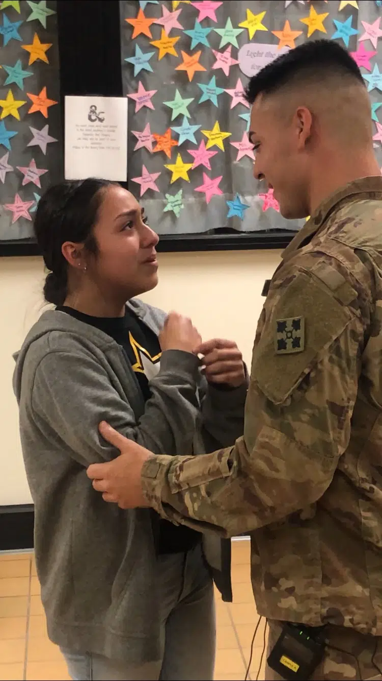 Student's brother returns from deployment to surprise her at school