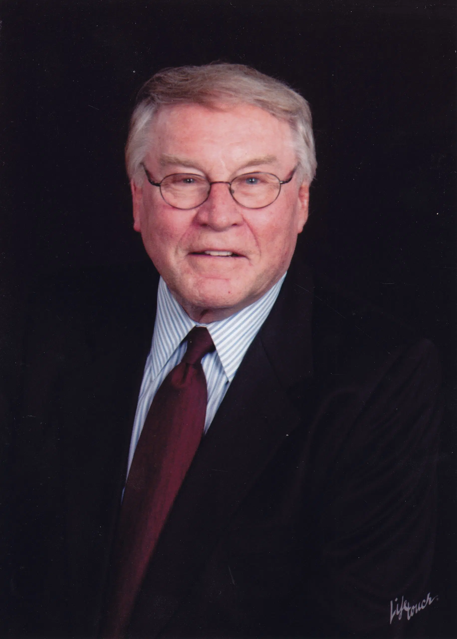 Dr. Kenneth Edward Tiemann