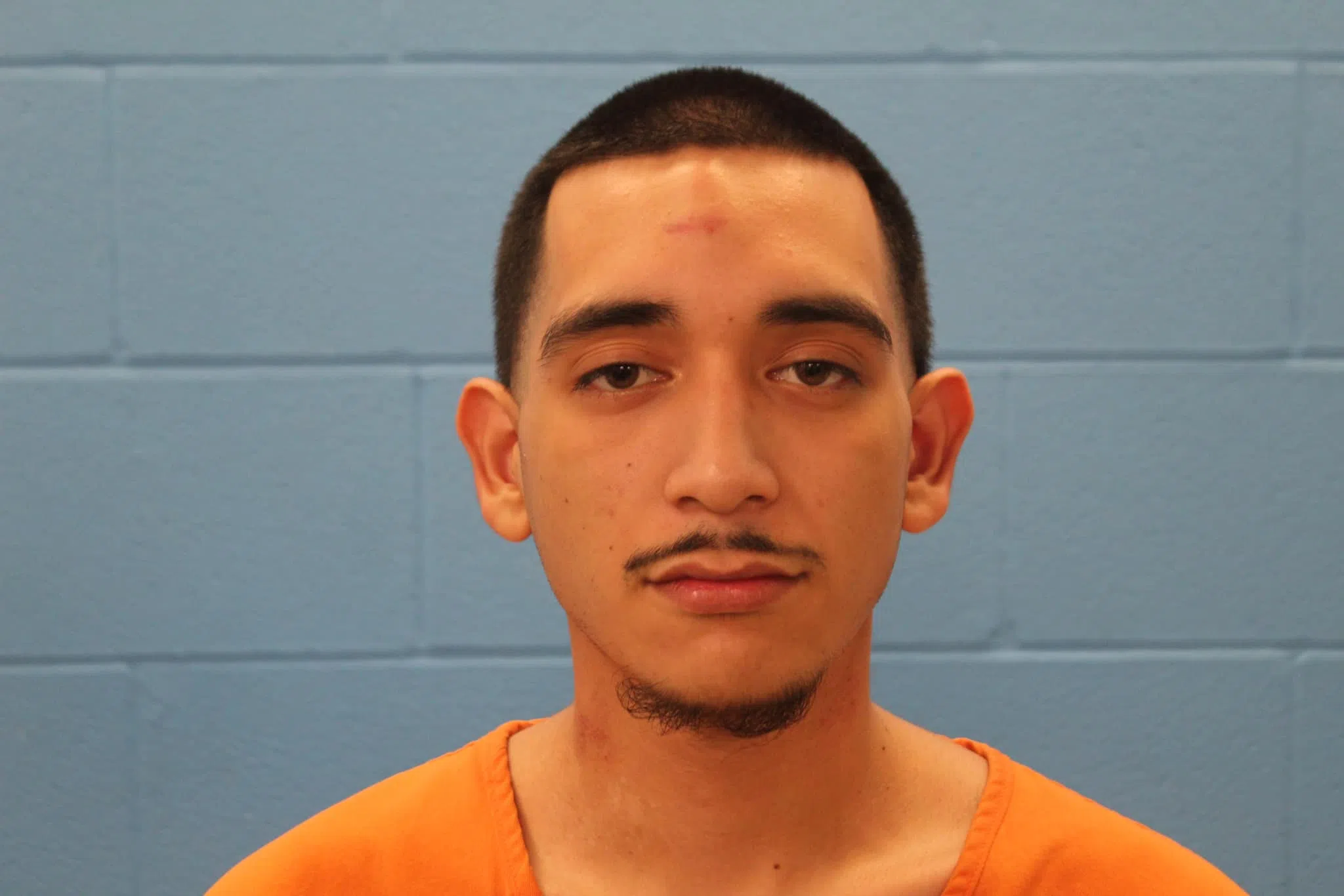 Man arrested after bringing guns to Matador graduation