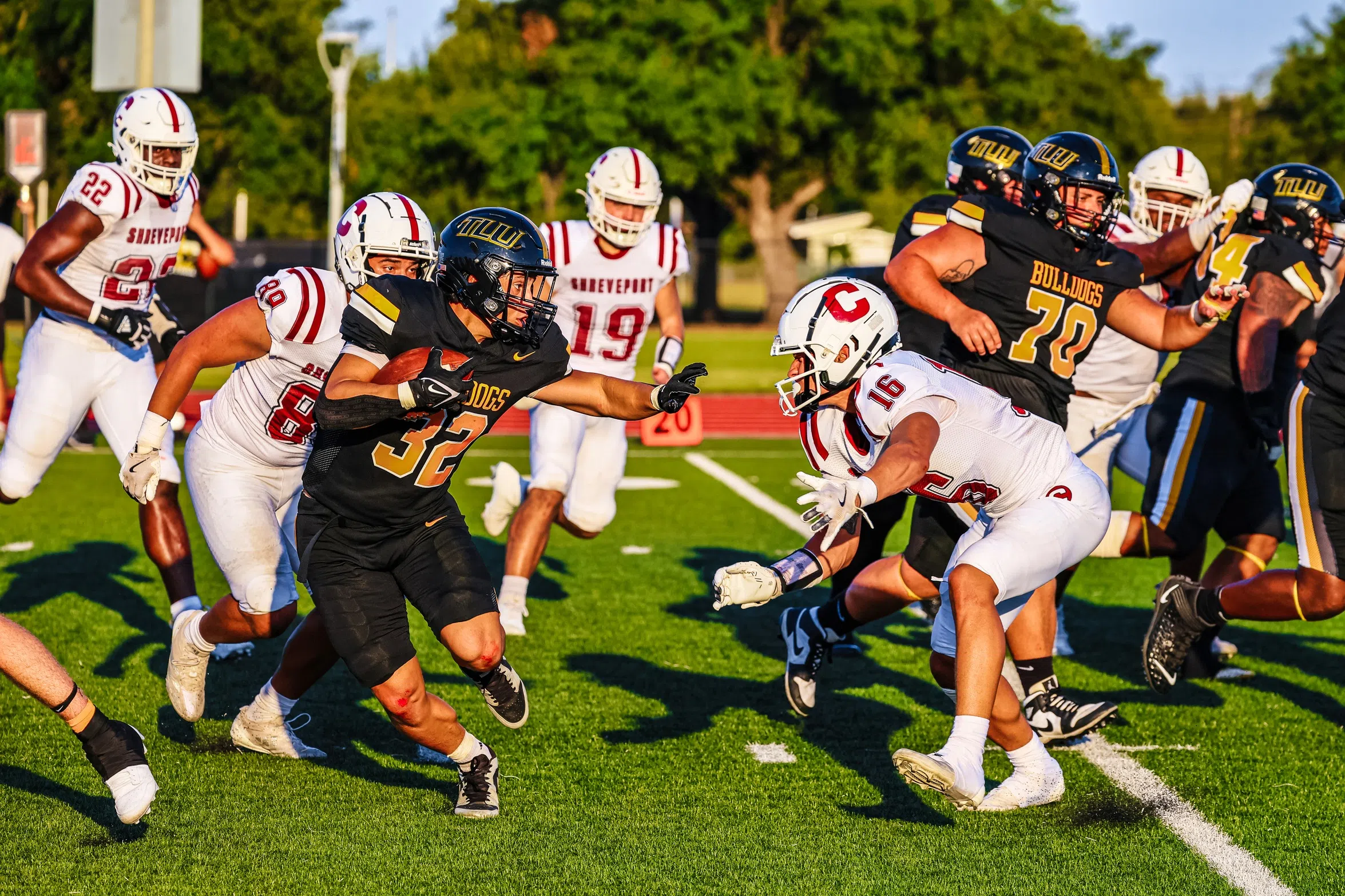 FOOTBALL -- Texas Lutheran Lights Up Lyon, 49-0