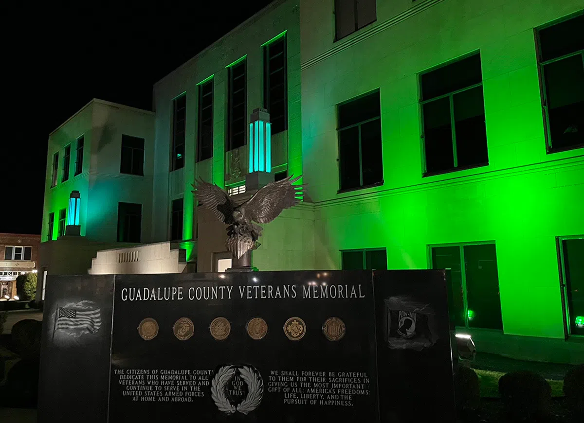 Guadalupe County lights up historic courthouse Green in support of Veterans