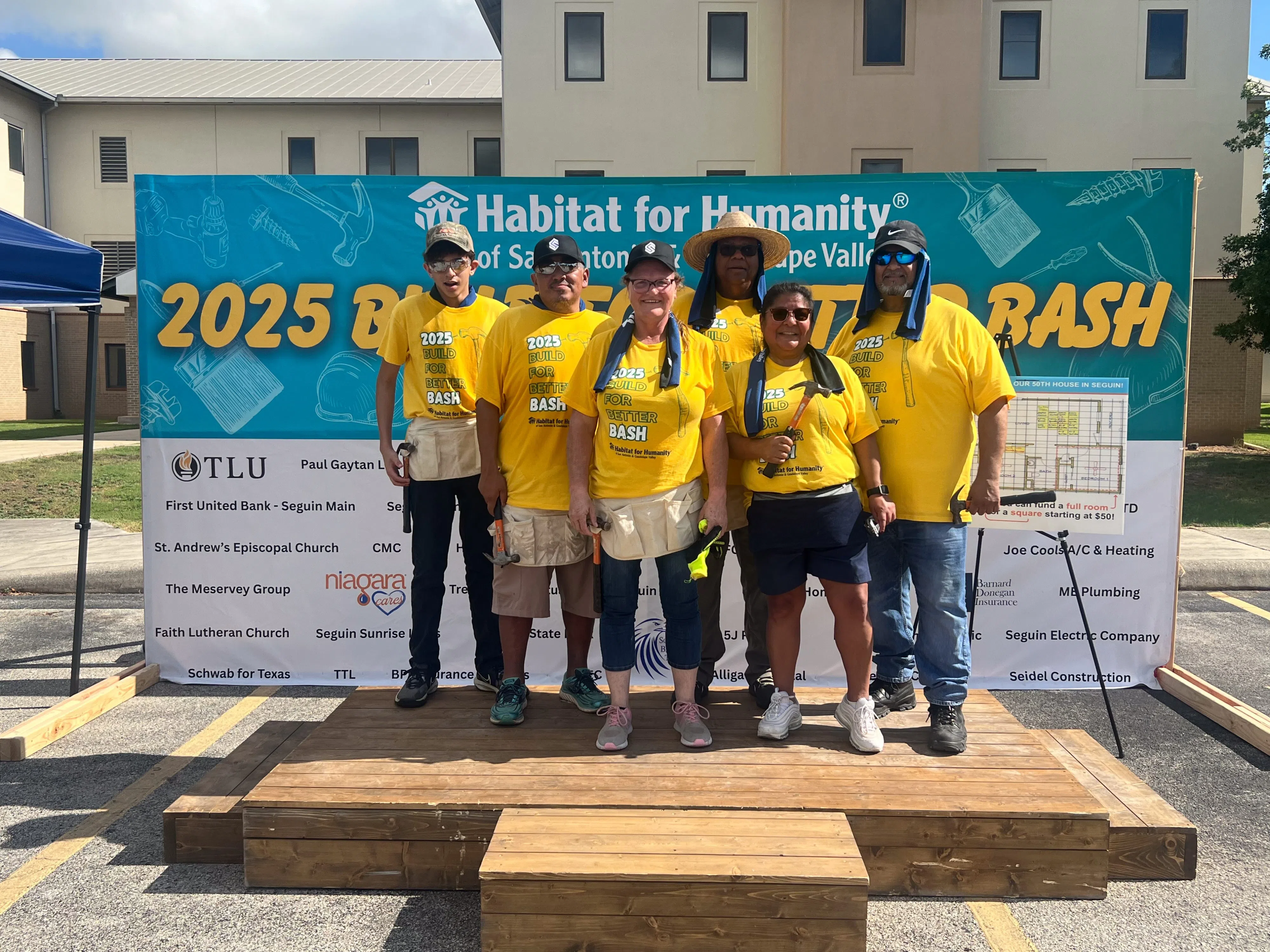 Framing the Future: Local employees spend the day on the job helping others