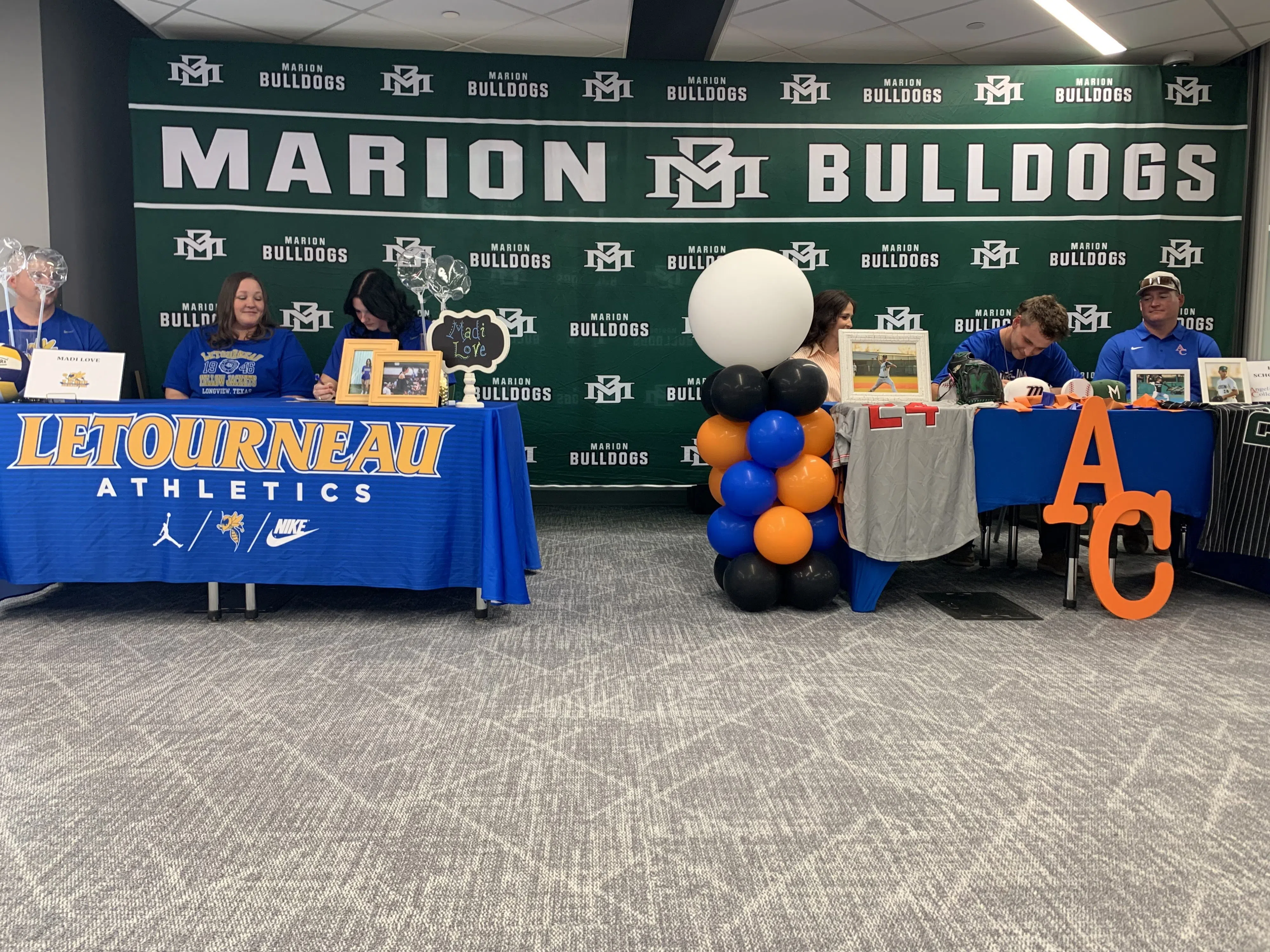 Marion MVP student-athletes Love and Schoenvogel sign college letters of intent