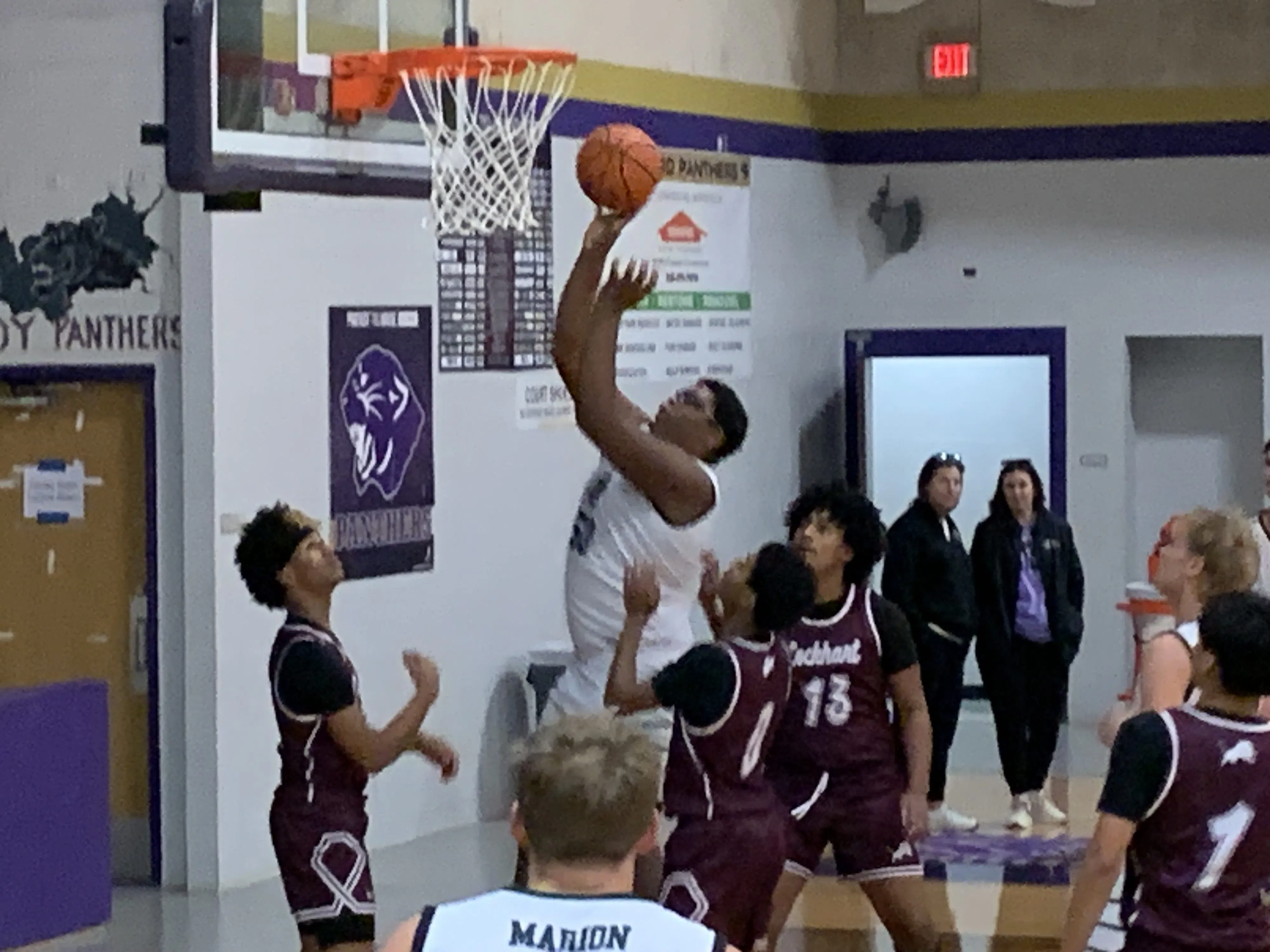 Marion and Navarro boys basketball teams to compete tonight in bi-district playoffs; Bulldogs playoff to air on KWED