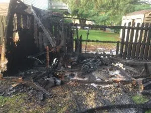 Fire demolishes storage shed