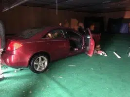 Car runs into, through Edinburgh building