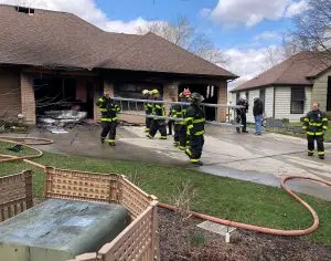 Accidental fire damages car, garage, home
