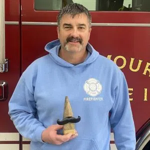 Asst. Chief Walker wins Seymour Fire Dept. mustache contest