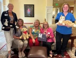 Thrive Alliance donates robotic pets to Our Hospice dementia patients