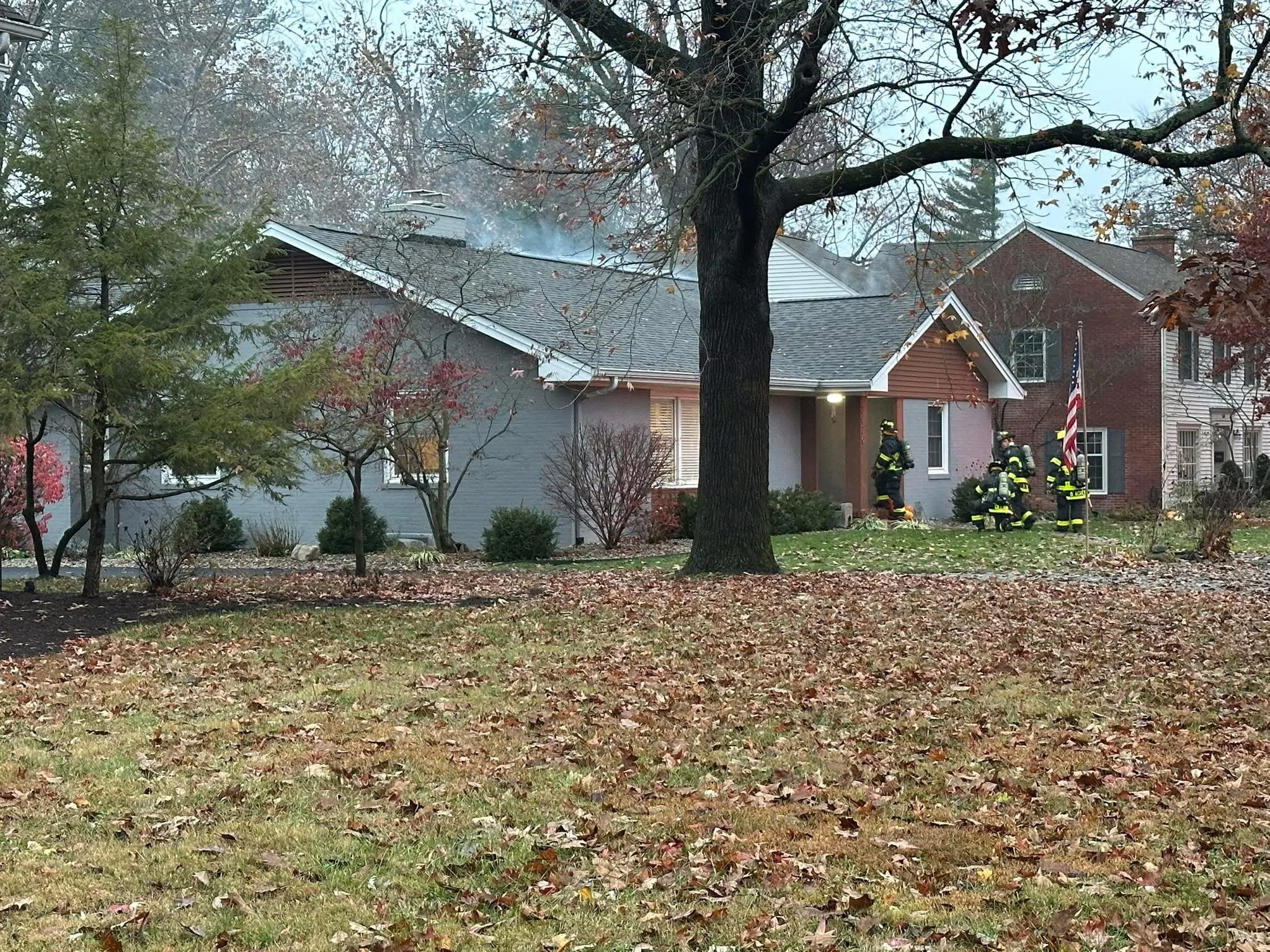 Columbus firefighters battle attic fire on Washington Street; Red Cross assisting displaced family