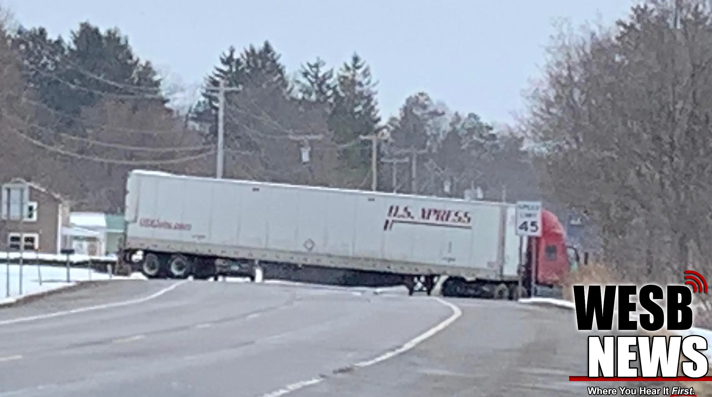 Jackknifed Tractor-Trailer Blocks 417