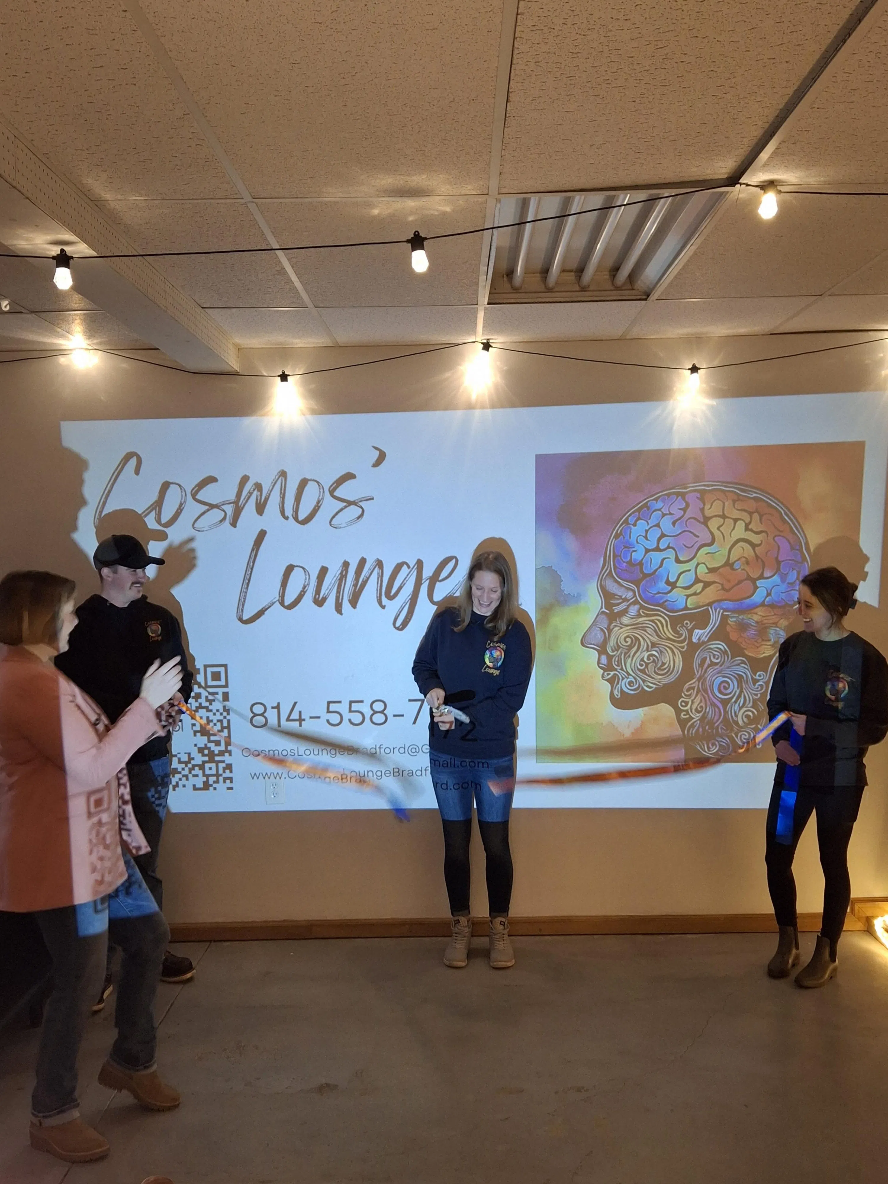 Ribbon Cut on Cosmo's Lounge