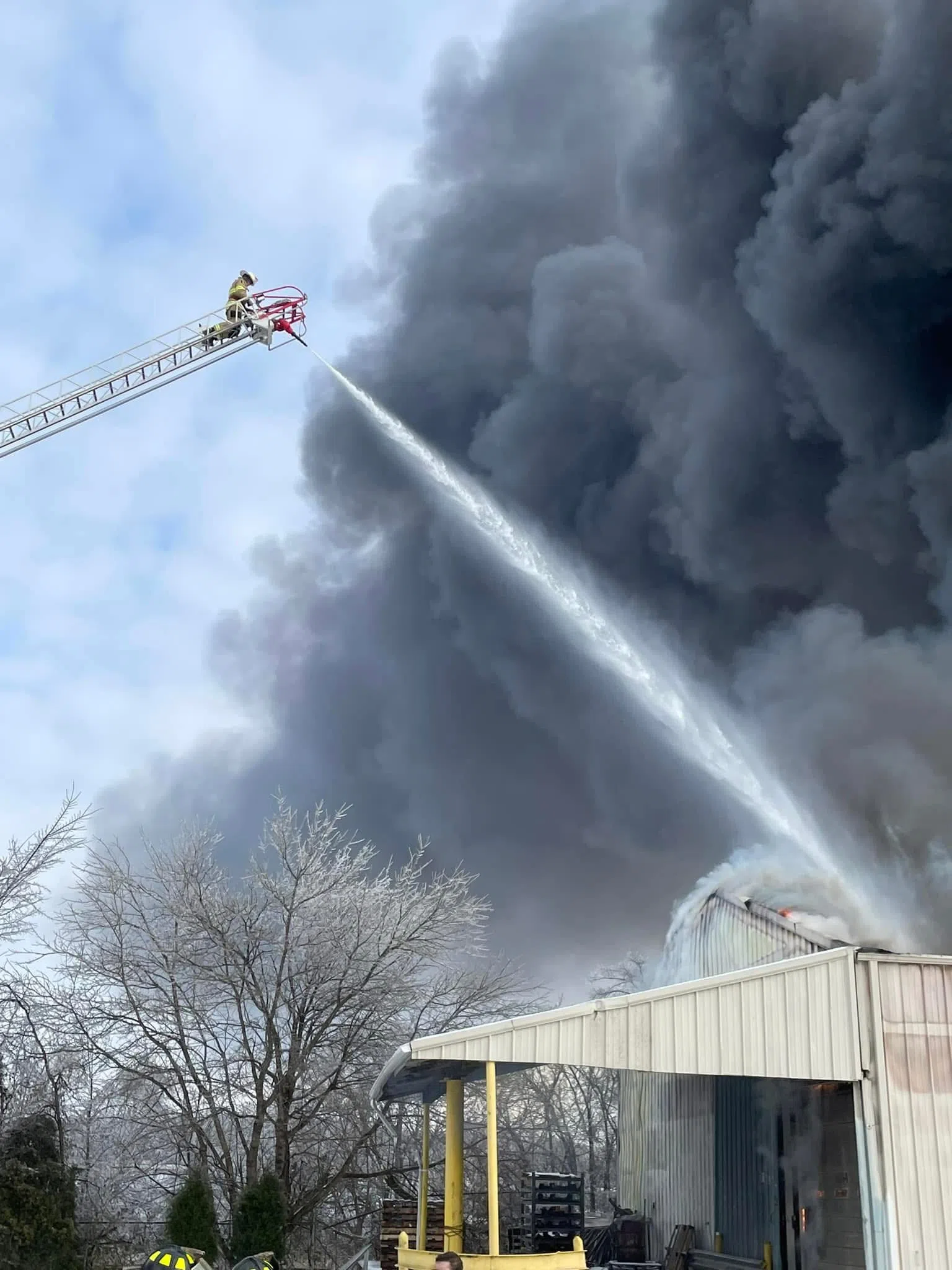 UPDATE: Firefighters continuing to manage hotspots from warehouse fire