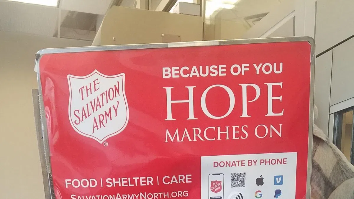 Salvation Army kettle collects 1st gold coin of season 97 KYCK