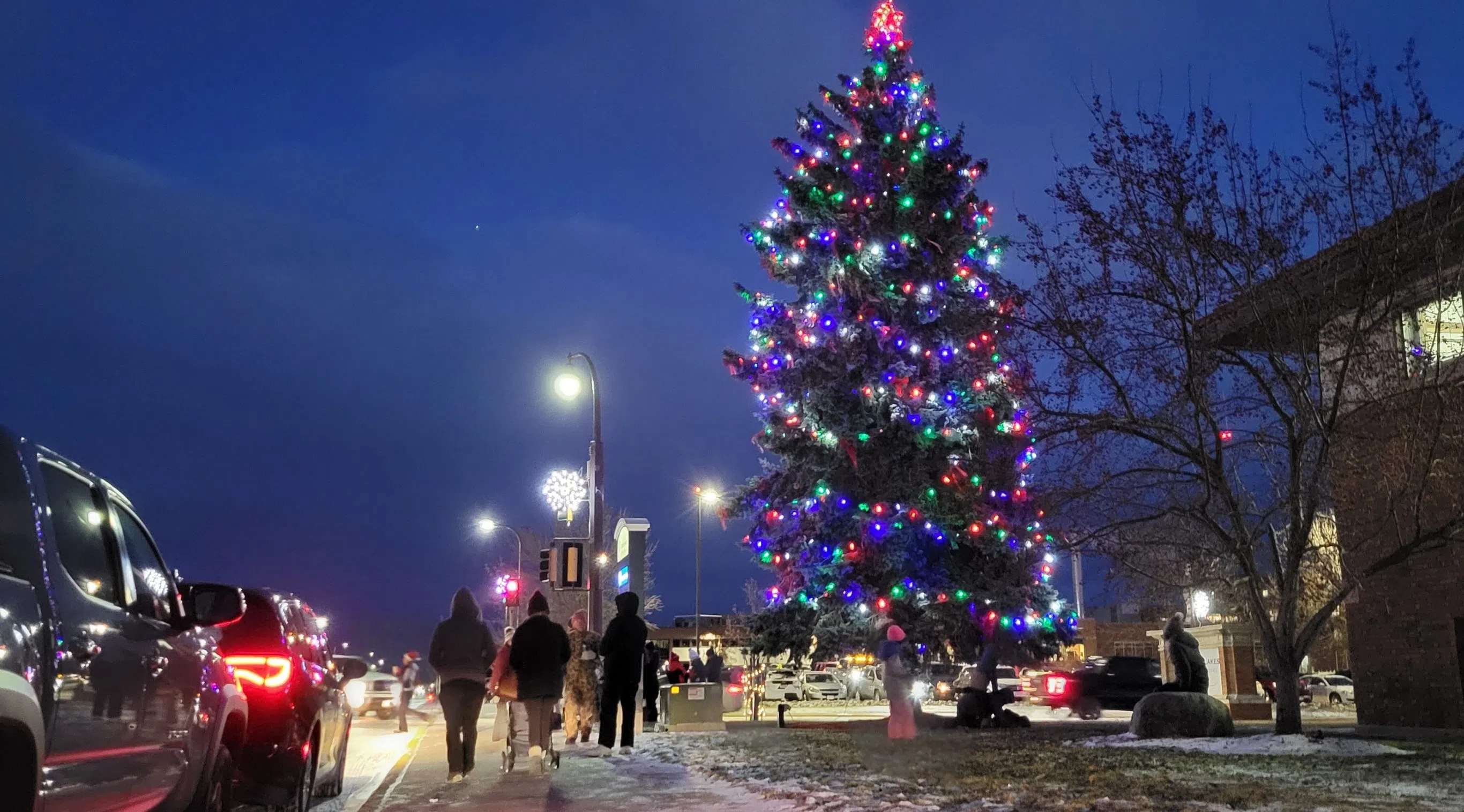 Nearly 30 holiday floats twinkle their spirit during the 2023 Parade of