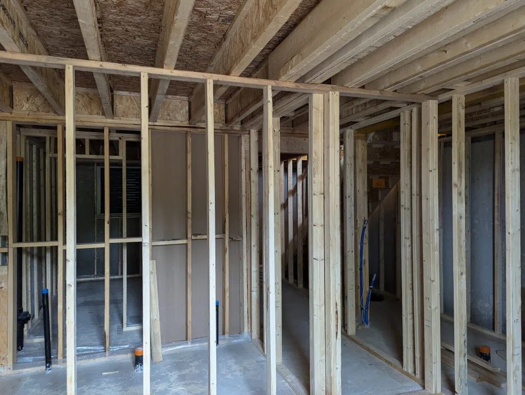 The Garafraxa Village Habitat for Humanity build in Fergus. This image shows the framing in the basement of one unit.