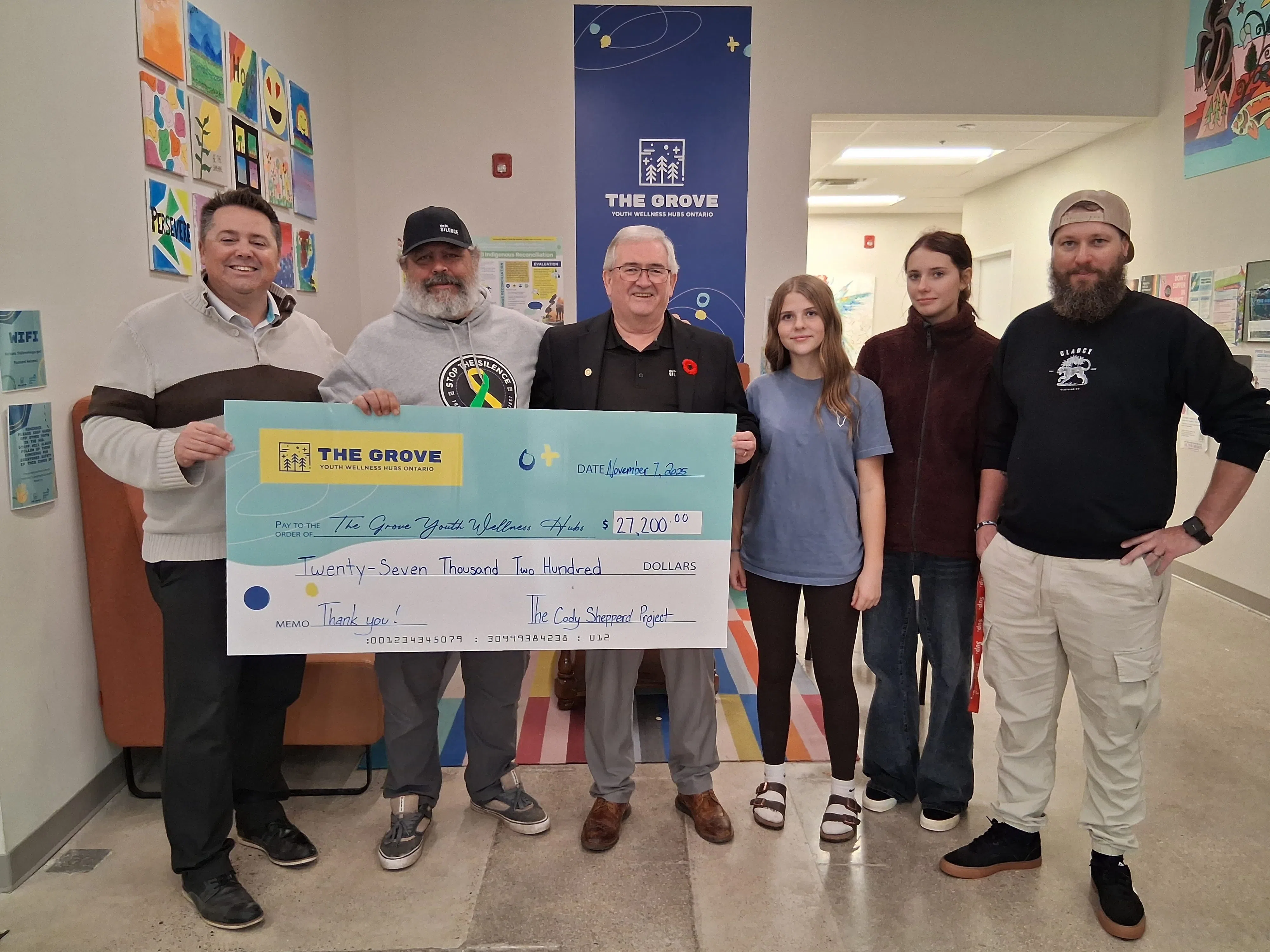 Cody Shepperd Project Annual Golf Tournament Presents Donation to The Grove Youth Wellness Hubs