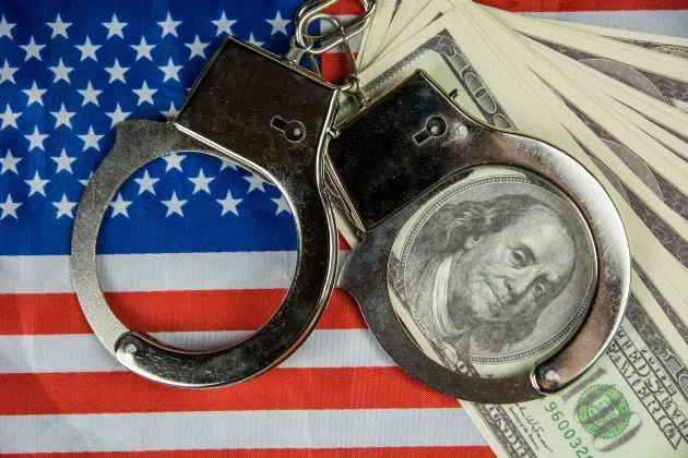 arrest handcuffs tax cheat