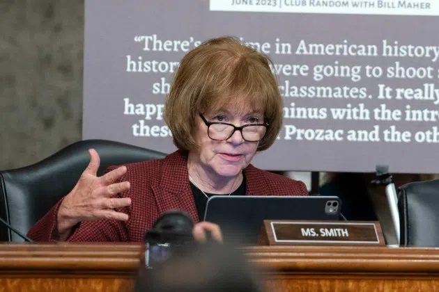 Sen. Tina Smith, D-Minn., questions Robert F. Kennedy Jr., President Donald Trump's choice to be the Secretary of Health and Human Services, as he testifies before the Senate Finance Committee during his confirmation hearing, at the Capitol in Washington, Wednesday, Jan. 29, 2025.