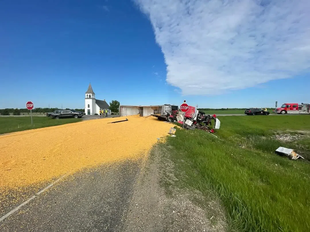 Semi-truck and pickup collision scene