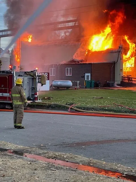 Over a dozen fire departments battle blaze at grain elevator in northeast North Dakota