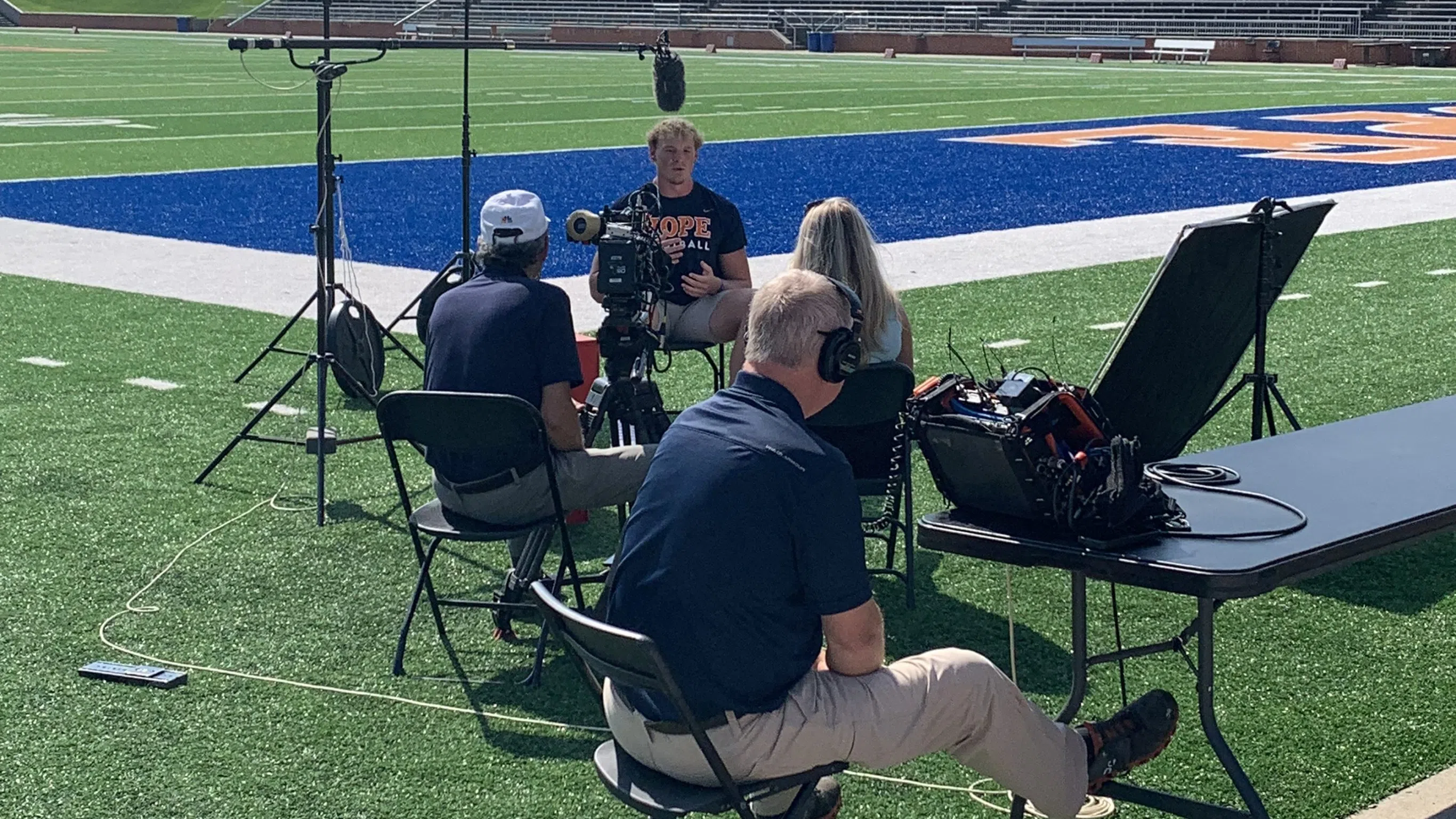 Derik Smith interviewed by a TV crew.