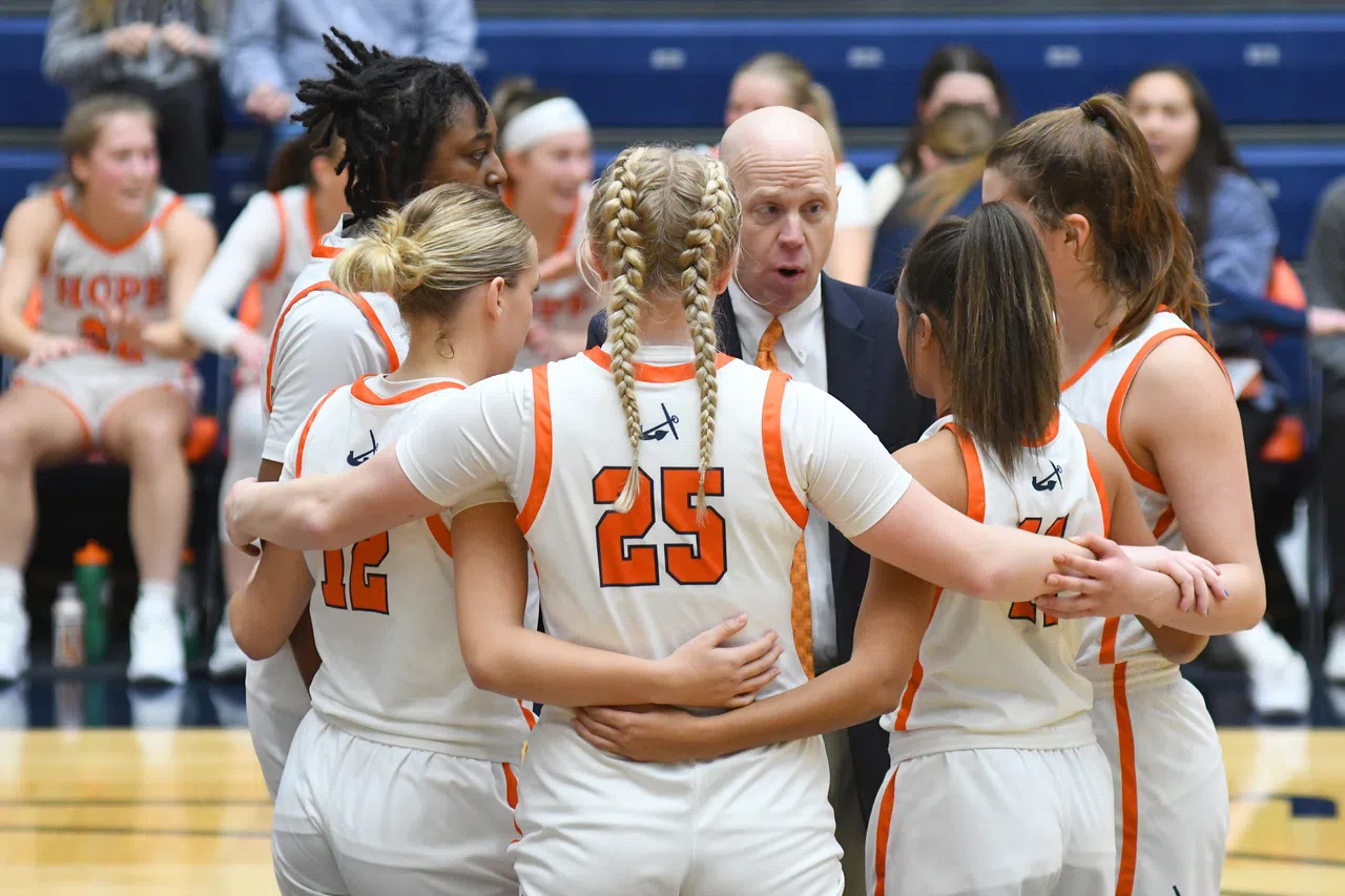 Head coach Brian Morehouse talks to his players during a timeout.