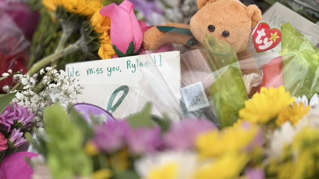 Flowers, cards, beanie baby, memorial