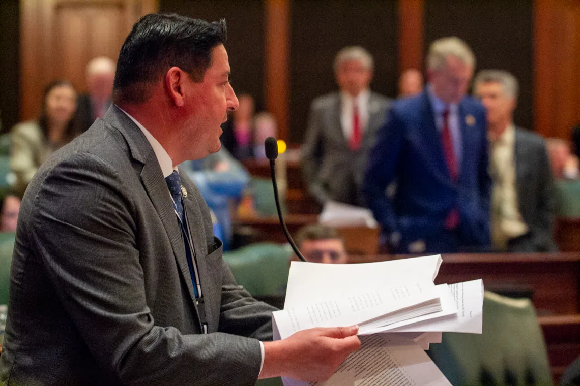 State Rep. John Cabello, R-Machesney Park, points out infrastructure projects that he describes a “pork” in the state budget on Saturday, May 31. (Capitol News Illinois photo by Jerry Nowicki)