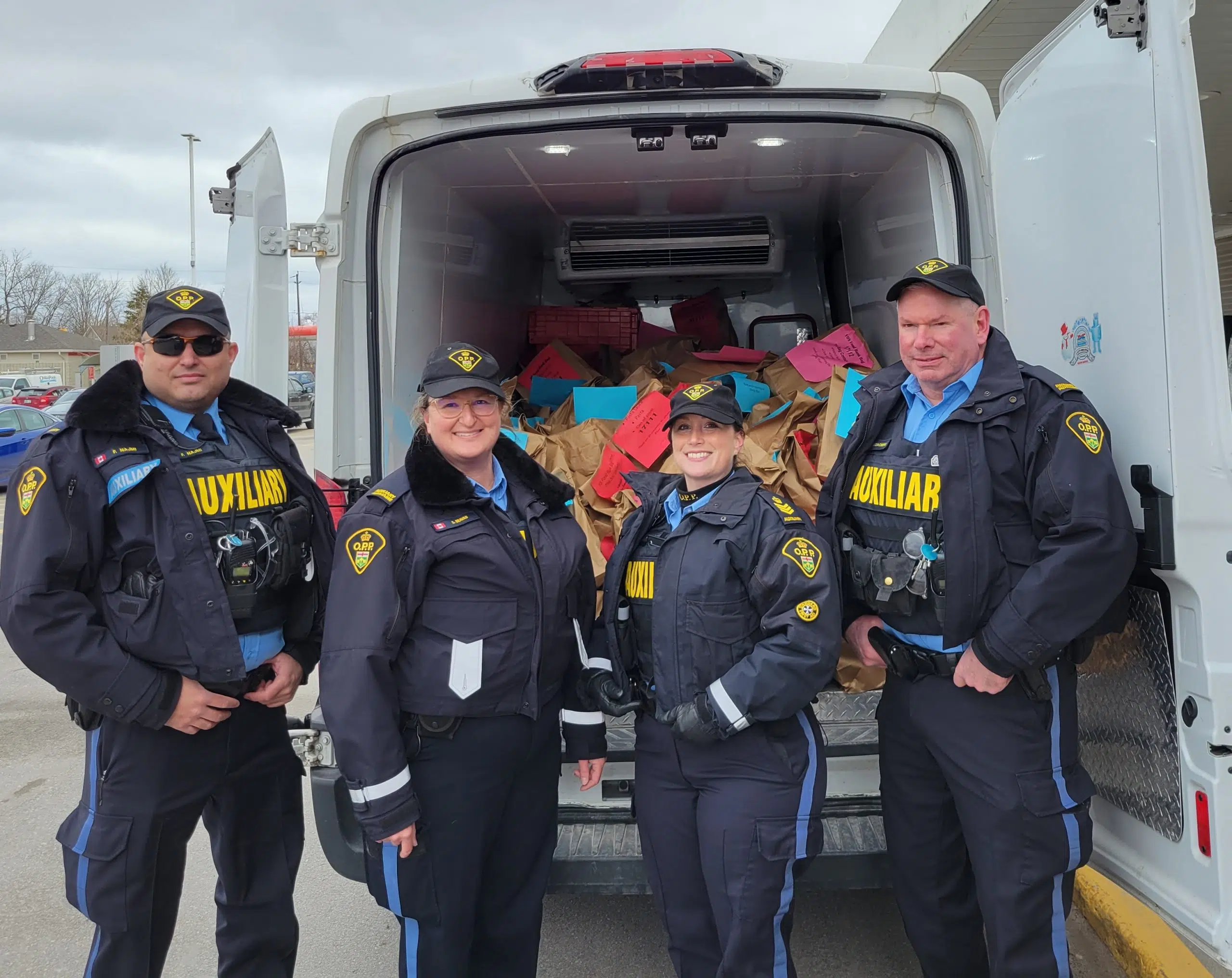 OPP Food Drive Raises Thousands For The Sharing Place