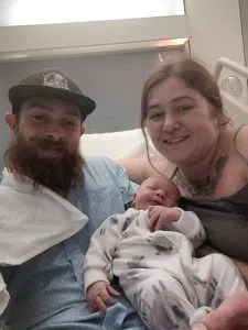 Elias Tripp with parents Kylee MacDonald and her partner Bryce Tripp