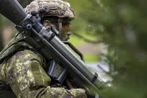 A soldier with an anti-armour weapon in the woods