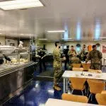 Visitors from the Army in the cafeteria on Monday's tour.