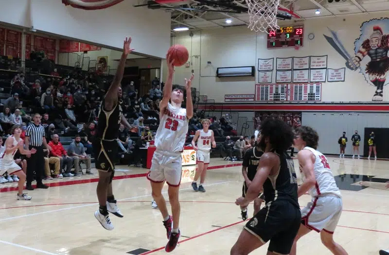 Emporia High boys upset Junction City, girls cruise to win